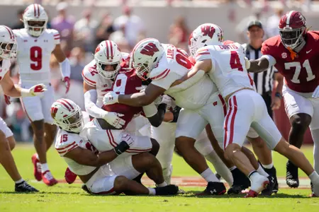 Wisconsin Badgers stuff a running attempt during an NCAA college football game against the Alabama Crimson Tide, Sat., Sept. 13, 2025, in Tuscaloosa, Ala. (Photo by David Stluka/Wisconsin Athletic Communications)