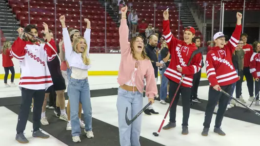 A fan wins season tickets at the student shootout