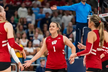 Una Vajagic celebrates after a rally against Marquette.