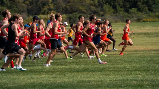 Liam Newhart leads the Badgers off the starting line