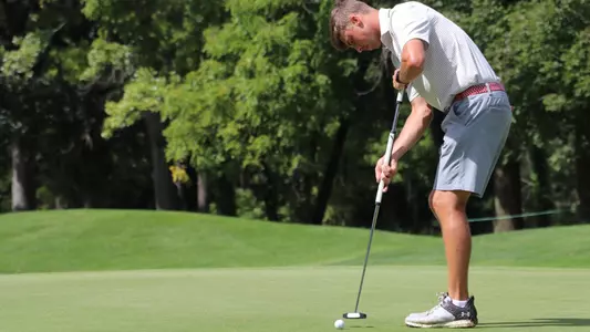 James Boustead putts at UW qualifier