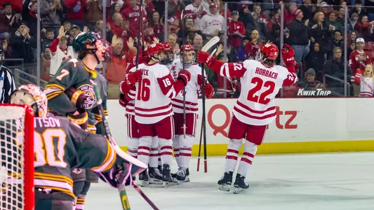 Badgers celebrate a goal vs. Alaska Anchorage