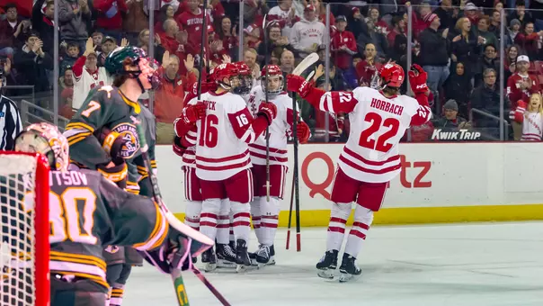 Badgers celebrate a goal vs. Alaska Anchorage