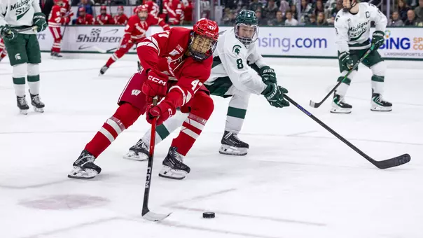 Blake Montgomery possesses the puck at Michigan State