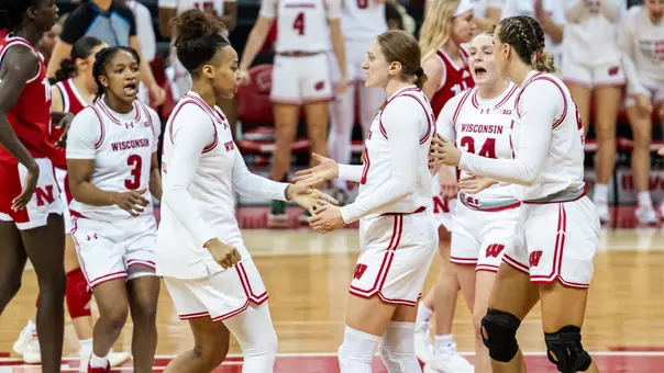 Badgers celebrate after a win against Nebraska.