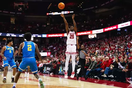 John Blackwell takes a three-point shot against UCLA at the Kohl Center.