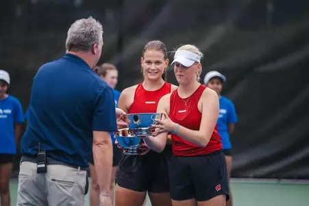 Maria Sholokhova and Lucie Urbanova receive their ITA Doubles All American trophy