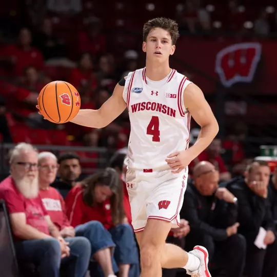 Wisconsin Badgers guard Zach Kinziger (4) handles the ball during an exhibition NCAA college basketball game against UW-Parkside Rangers, Oct. 10, 2026, in Madison, Wis. The Badgers won 94-71. (Photo by David Stluka/Wisconsin Athletic Communications)