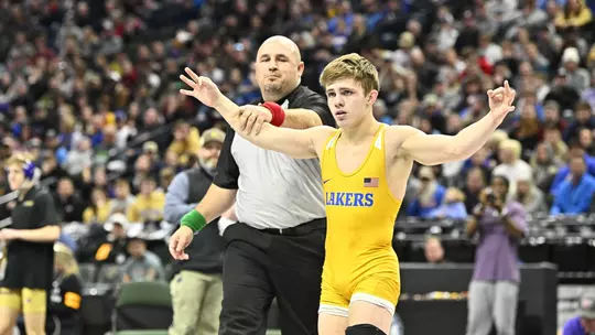 Alan Koehler wrestling in high school for Prior Lake