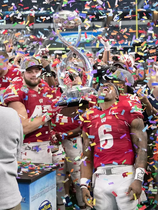 Wisconsin Badgers celebrate after winning the 2017 NCAA Cotton Bowl football game against the Western Michigan Broncos Tuesday, January 2, 2017, in Irving, Texas. The Badgers won 24-16. (Photo by David Stluka)