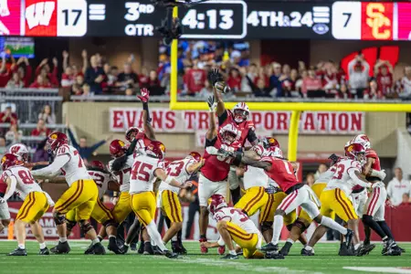Wisconsin Badgers defense blocks a kick during a an NCAA Big Ten Conference college football game against USC Trojans, Sat., Oct. 24, 2026, in Madison, Wis. (Photo by David Stluka/Wisconsin Athletic Communications)