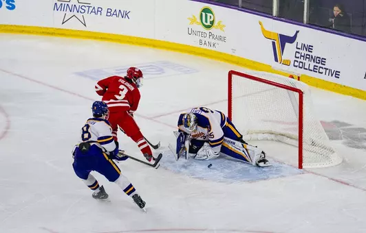 Brent Solomon takes the puck to the crease