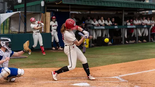 Jackie Showalter barrels a pitch in Texas.