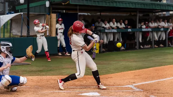 Jackie Showalter barrels a pitch in Texas.