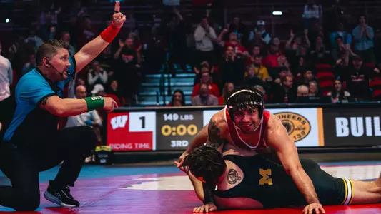 Joe Zargo scores a takedown over Michigan