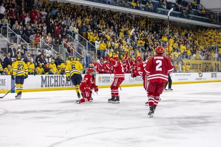 Adam Pietila celebrating a goal at Michigan