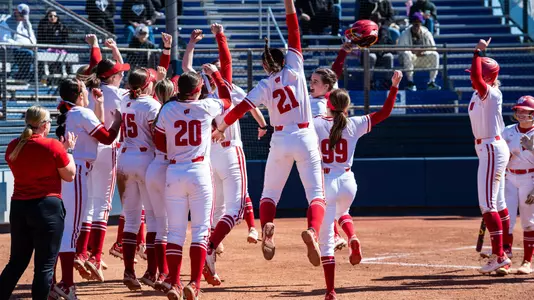 Hilary Blomberg celebrates after hitting 20th career home run.