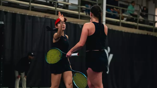 Usui and Sholokhova after winning a doubles match