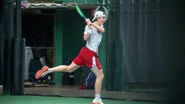 Ferdinand Kloesters returns a serve in doubles action