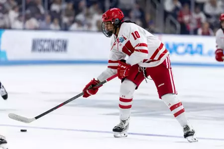 Laila Edwards with the puck. - Wisconsin Women's Hockey at Penn State - 2026 NCAA Women’s Frozen Four