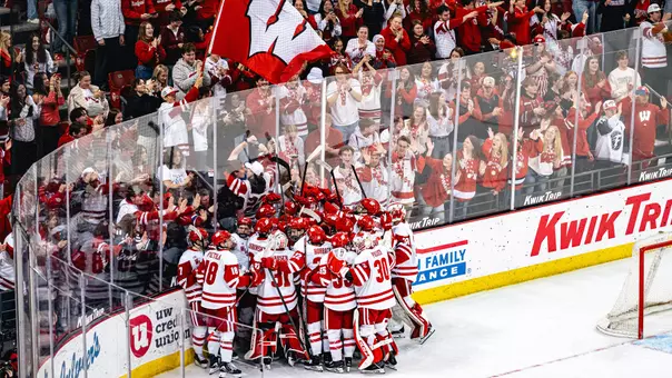 Wisconsin men's hockey team celebrates a win
