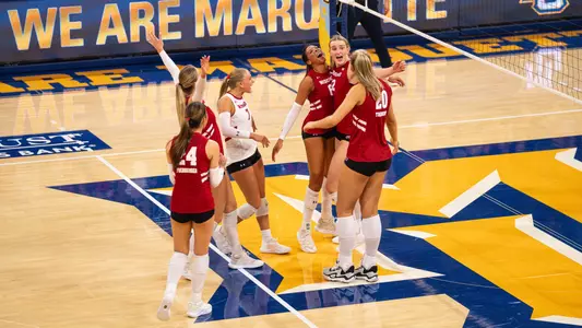Badgers celebrate after a rally against Marquette.