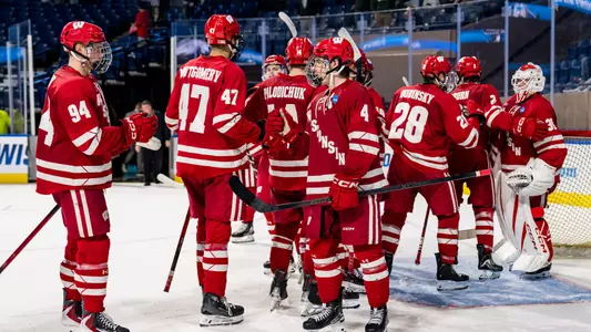Wisconsin men's hockey celebrates a win in the NCAA Tournament regional semifinals