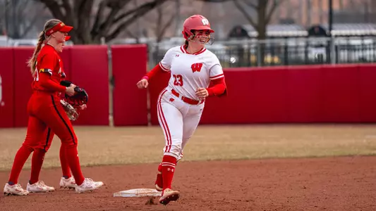 Hilary Blomberg runs around the bases after hitting a game-winning HR.