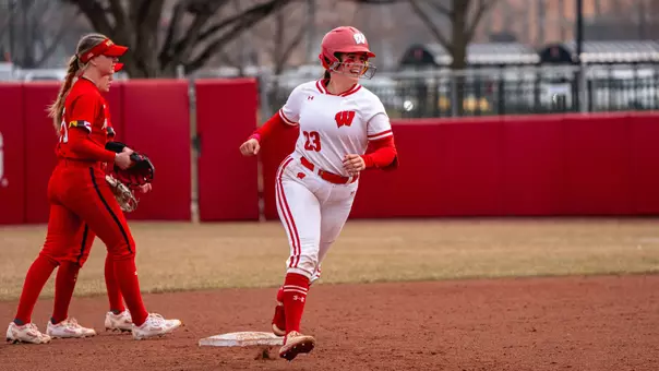Hilary Blomberg runs around the bases after hitting a game-winning HR.