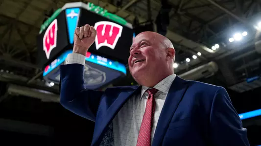 Mike Hastings pumps his fist after advancing to the Frozen Four