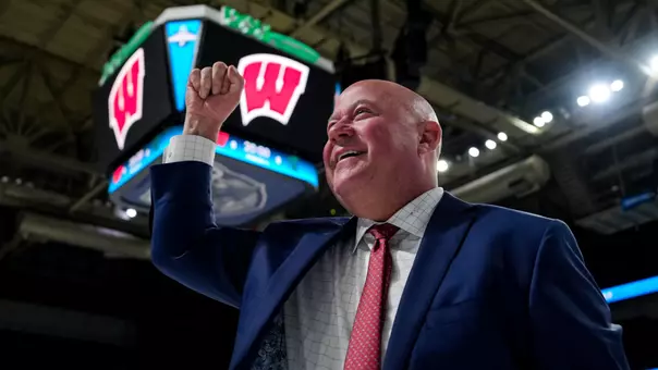 Mike Hastings pumps his fist after advancing to the Frozen Four