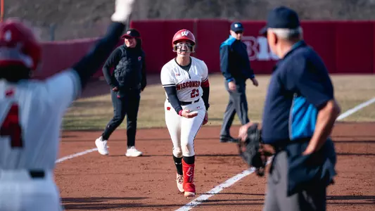 Hilary Blomberg celebrates as she rounds the bases after a HR.