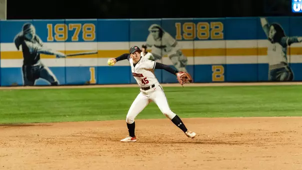 Alivia Bark throws across the infield against UCLA.