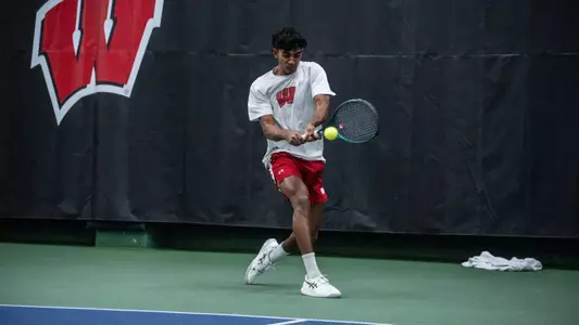 Sachiv Kumar hits the tennis ball