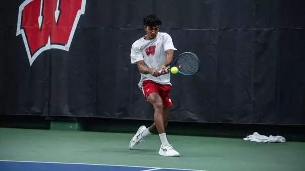 Sachiv Kumar hits the tennis ball