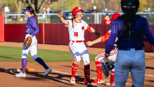 Hannah Conger celebrates after walk-off base hit against St. Thomas