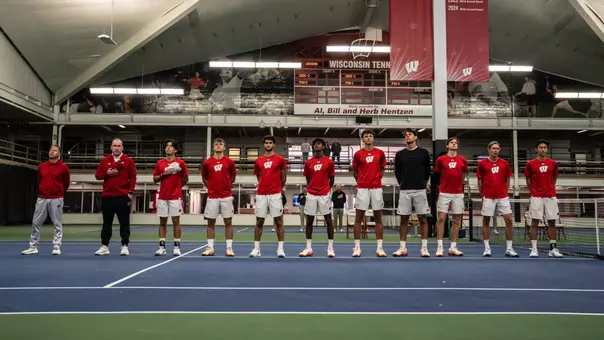 Men's Tennis stands for the National Anthem