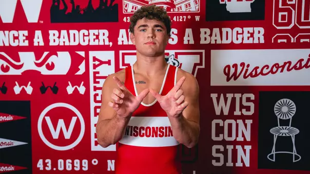 Caleb Denee red backdrop