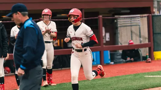 Kaylie Whidden rounds the bases after hitting a HR.