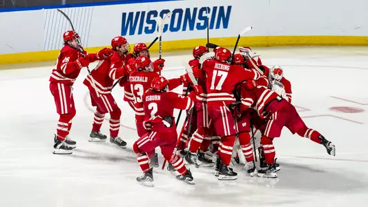 Badger men's hockey celebrates Dexheimer's overtime game-winning goal to send them to the Frozen Four