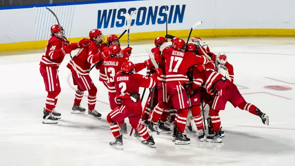 Badger men's hockey celebrates Dexheimer's overtime game-winning goal to send them to the Frozen Four