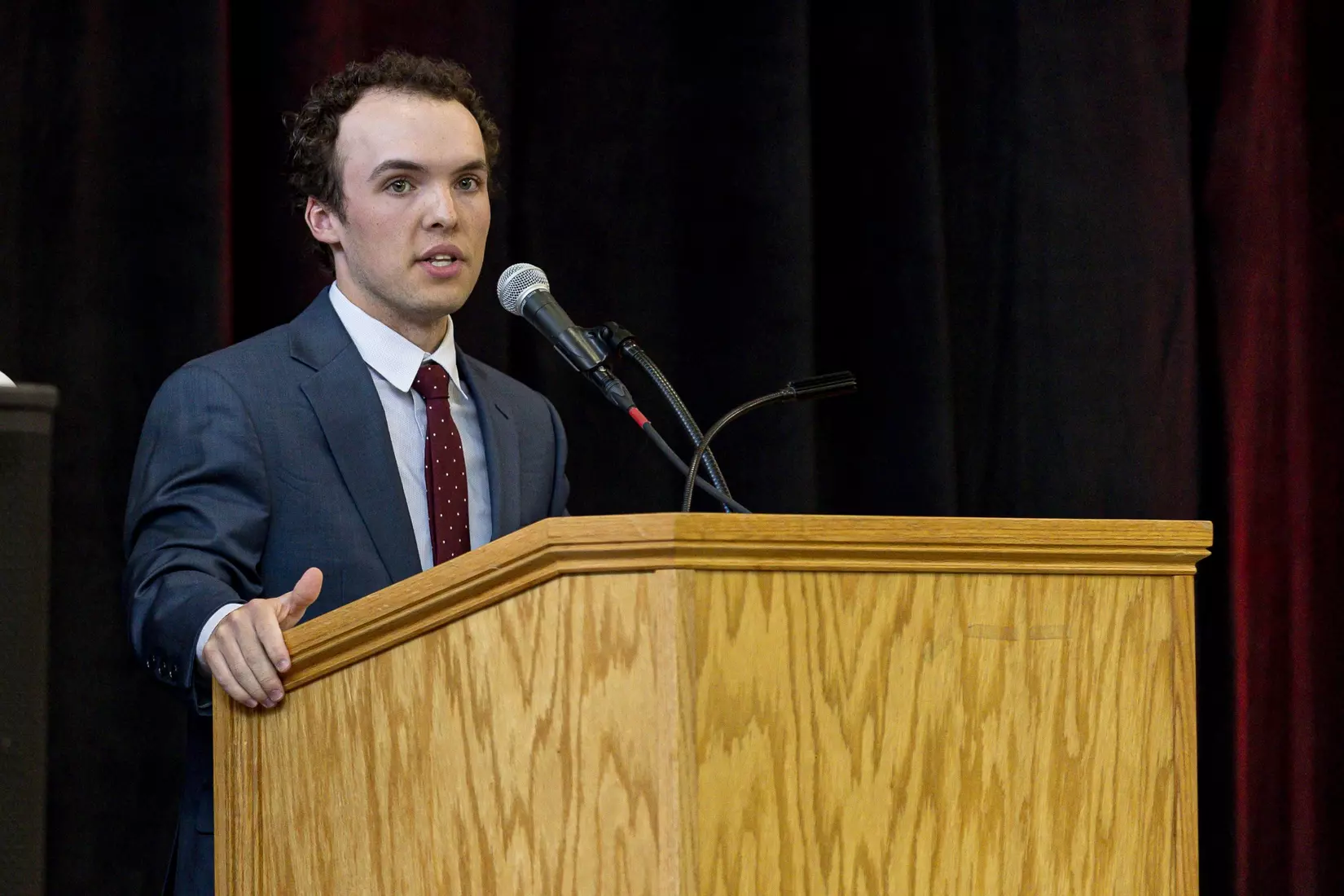 Men's rower Liam Smith speaks at the Class of 2026 Student-Athlete Graduation Ceremony
