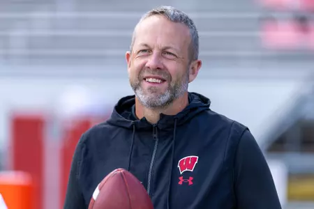 Wisconsin Badgers assistant coach Matt Mitchell looks on during warmups prior to an NCAA college football game against the Middle Tennessee Blue Raiders, Sat., Sept. 6, 2025, in Madison, Wis. The Badgers won 42-10. (Photo by David Stluka/Wisconsin Athletic Communications)
