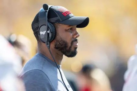 Wisconsin Badgers Assistant Coach Kenny Guiton looks on during a Big Ten Conference NCAA college football game against the Michigan Wolverines Sat., Oct. 4, 2025, in Ann Arbor, Michigan. The Wolverines won 24-10. (Photo by David Stluka/Wisconsin Athletic Communications)