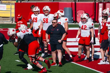 Eric Mateos coaches the Badgers during practice