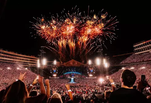 Coldplay playing at Camp Randall Stadium with fireworks in the air - Live at Wisconsin