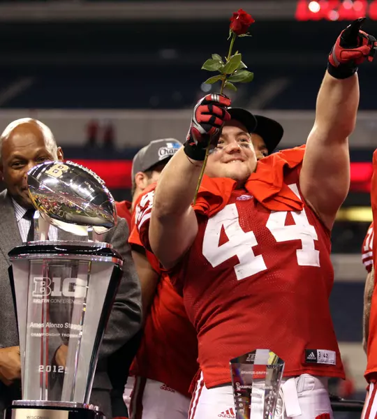 Chris Borland celebrates a Big Ten Championship