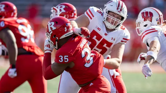 Wisconsin Badgers offensive lineman Kevin Heywood (55) blocks during a Big Ten Conference NCAA college football game against the Rutgers Scarlet Knights, Saturday, Oct. 12, 2024, in Piscataway, NJ. The Badgers won 42-7. (Photo by David Stluka/Wisconsin Athletic Communications)