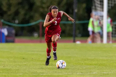 Jadea Collin sprinting down the field with the ball - Wisconsin Women's Soccer vs BYU
