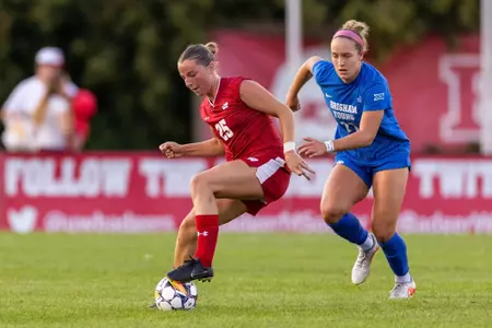 Erin Connolly battles for position with the ball - Wisconsin Women's Soccer vs BYU